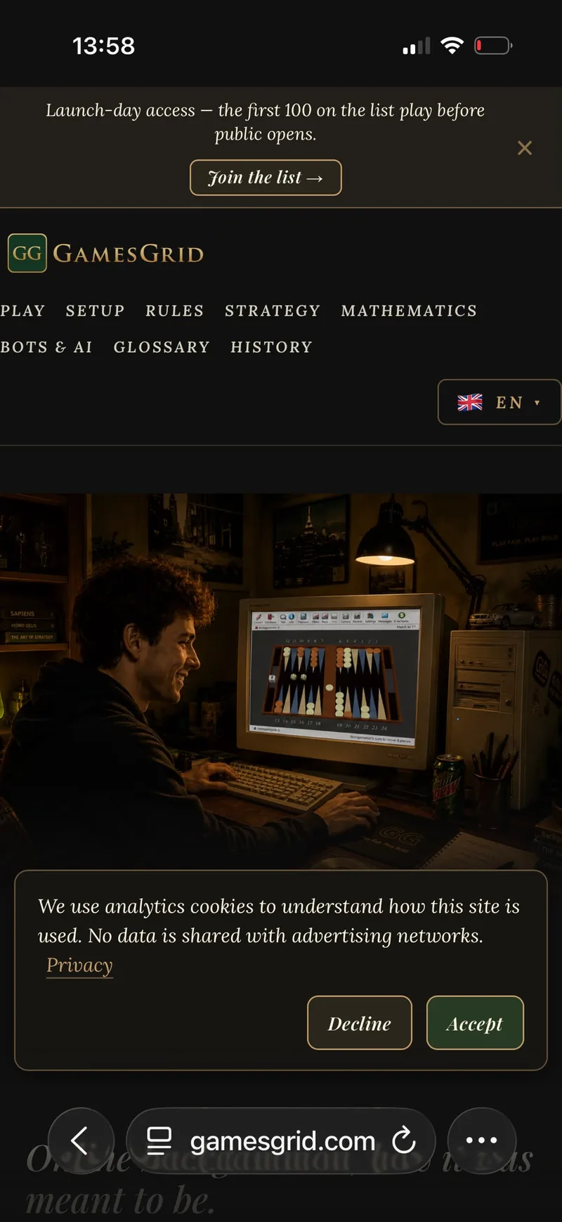GamesGrid open in Safari on an iPhone, with the three-dots button next to the address bar